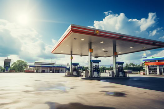 Scenic view of a petrol gas station against a blue sky with clouds AI Generated photo