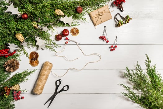 Juniper branches with a Christmas decor. Christmas, New Year background. Coniferous branches of juniper. Top view, flat design. photo