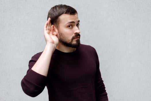Coworker hearing dirty rumors about his boss. photo