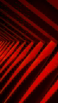 Ornaments on the Sam Poo Kong Pagoda in Semarang, a building lined with red pillars and black lines interspersed with reflections of sunlight.no people photo