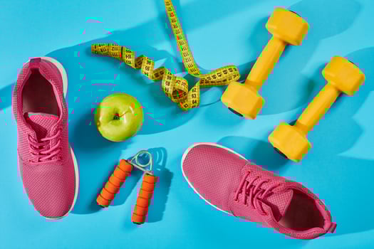 Female sport shoes and equipment top view, copy space. Active lifestyle, body care concept. photo