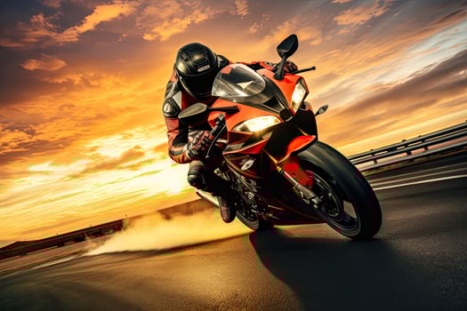 Motorcycle rider rides on asphalt road at sunset. Sport bike, Motorcycle rider on sport bike rides fast on race track at sunset. Extreme athlete Sport Motorcycles Racing, AI Generated photo