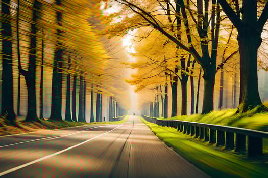 a long exposure photograph of a road in the fall. AI-Generated photo