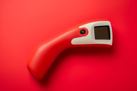 Modern non contact infrared thermometer on red background. Generate Ai photo