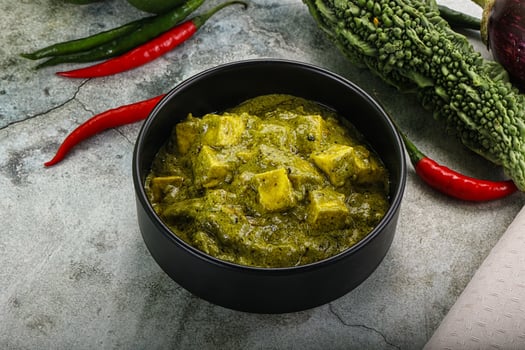 Indian cuisine - palak paneer cheese with spinach photo