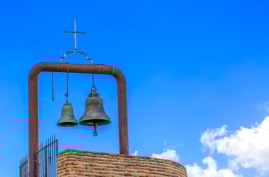 Orthodox bell tower and bell in the old church photo