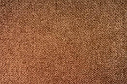 Brown velours upholstery fabric texture background. photo