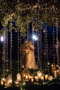 night wedding ceremony of the newlyweds in a country cottage photo
