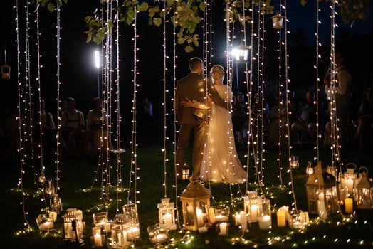 night wedding ceremony of the newlyweds in a country cottage photo