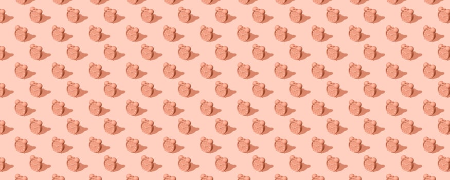 Banner of orange alarm clocks with shadow on orange background. Set. Seamless texture pattern. 3D illustration. Long shadow from the summer sunshine. photo