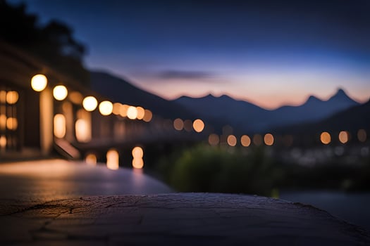 a view of the mountains at night with lights on the ground. AI-Generated photo