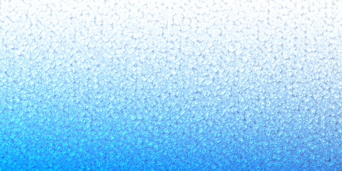 water drops on blue glass background photo