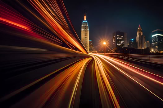 a long exposure photograph of a city at night. AI-Generated photo