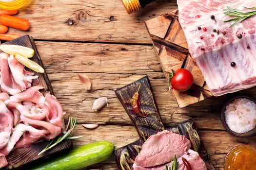 Raw meat on wooden board photo