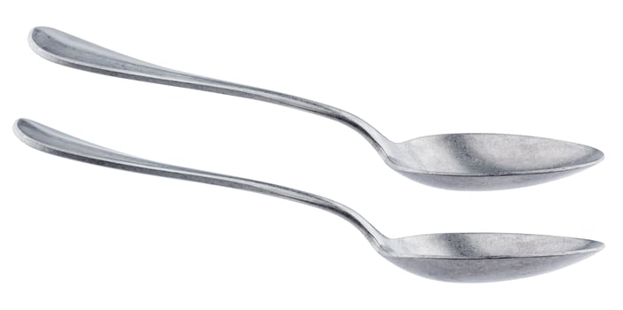 Metal spoon isolated on white background photo