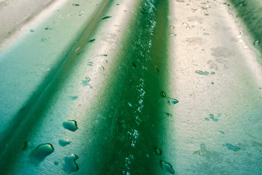 Texture of green color roof tile photo