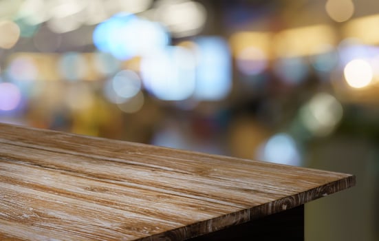 Empty wood table top and blur of out door garden background Empty wooden table space for text marketing promotion. blank wood table copy space for background photo