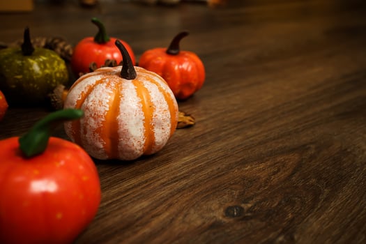 Halloween decorations background. Halloween Scary pumpkin head on wooden table Halloween holiday concept photo