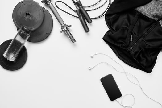 Top view of Sport stuff on white background. Fitness lifestyle concept. Free space for text photo