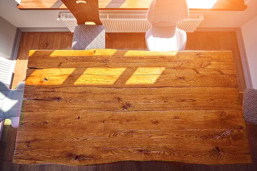 Top view of dining wooden table at the kitchen. Copy space photo
