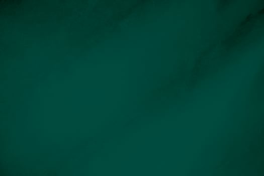 Green velvet fabric texture used as background. Emerald color panne fabric background of soft and smooth textile material. crushed velvet .luxury emerald tone for silk.. photo