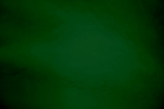 Light green velvet fabric texture gradient used as background. Emerald color panne fabric background of soft and smooth textile material. crushed velvet .luxury emerald tone for silk. photo