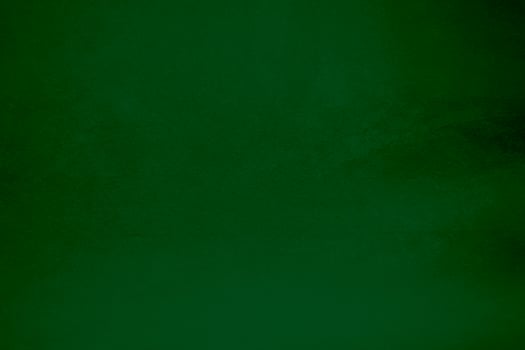 Light green velvet fabric texture gradient used as background. Emerald color panne fabric background of soft and smooth textile material. crushed velvet .luxury emerald tone for silk. photo