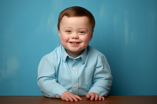 Ai generated Studio portrait of cute little boy with down syndrome on different colors background photo