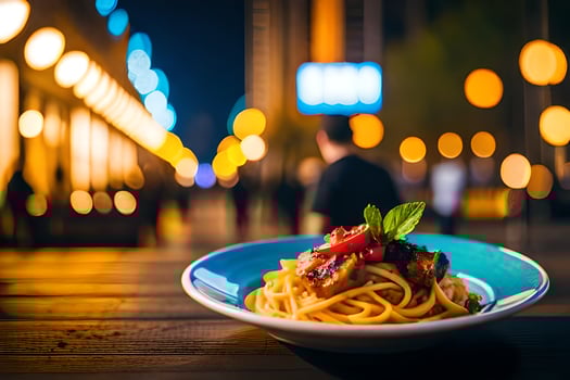 a plate of spaghetti with a man in the background. AI-Generated photo