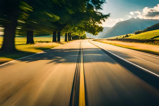 a blurry image of a road with trees and mountains. AI-Generated photo