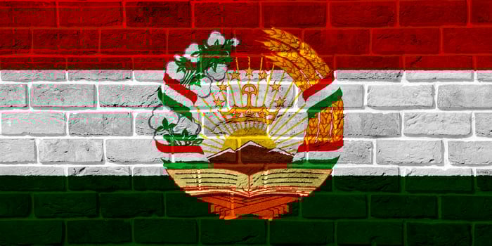 Flag and coat of arms of Republic of Tajikistan on a textured background. Concept collage. photo