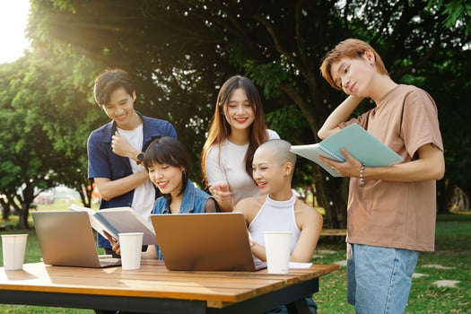 Image of a group of Asian students studying together photo