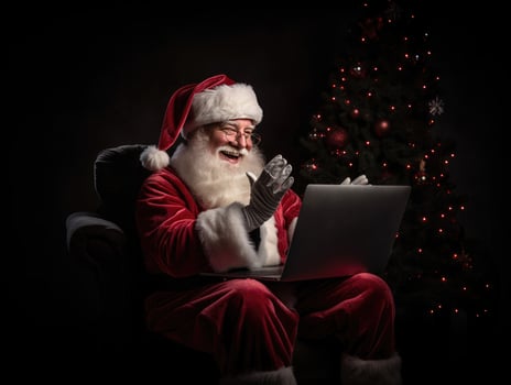 AI Generated AI generation. Santa Claus using a laptop computer. Sitting in a chair on the eve of photo