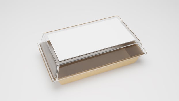 Plastic food packaging box with blank label, on white background. photo
