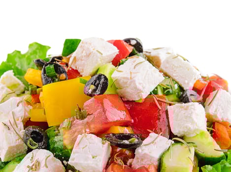 Greek salad with feta, tomatoes, olives photo
