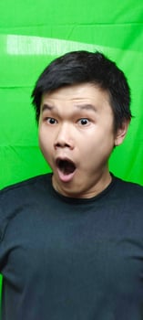 Astonishment with Wide Open Mouth Asian Facial Expression photo