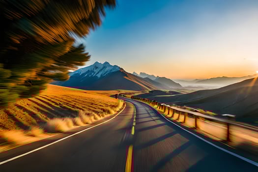 a road in the mountains with the sun setting. AI-Generated photo