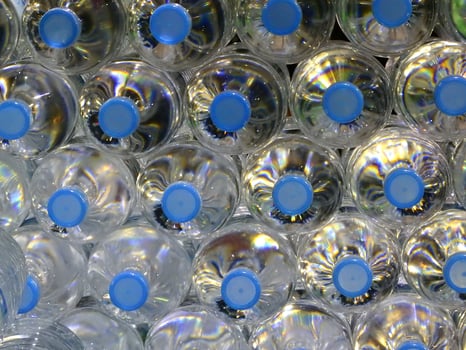 Close Up on mineral water bottles in top view photo