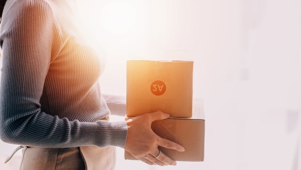 Business woman start up small business entrepreneur SME success .freelance woman working at home with Online Parcel delivery. SME and packaging deliveryconcept photo