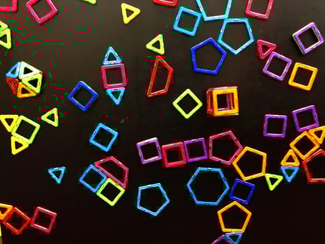 Many magnets are stuck on the blackboard photo