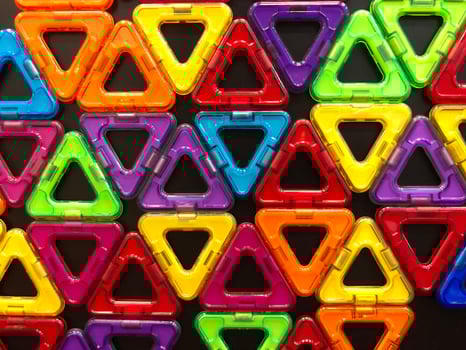 Many magnets are stuck on the blackboard. photo