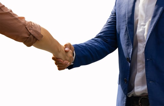 Business man and business woman shake hands photo