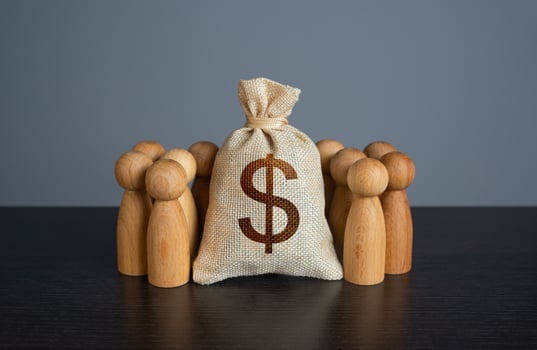 People around dollar money bag. Financial support. Crowdfunding and fundraising. Organization of the community budget. Social politics. Deposits and loans. Salaries and pensions. Social payments. photo