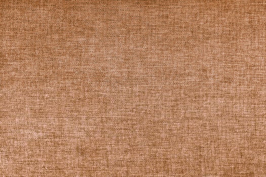 Texture of brown upholstery fabric. Decorative textile background photo