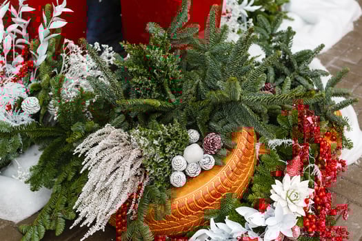 Christmas background with decorative star, fir branches and pine cones photo