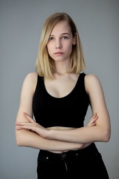 Portrait of a casual blonde woman in black top photo