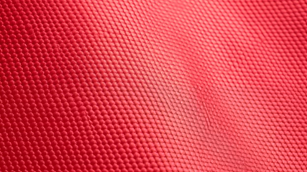 Red soccer jersey with air mesh texture. Athletic wear backdrop photo