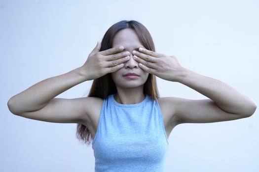 Asian woman has eye pain photo