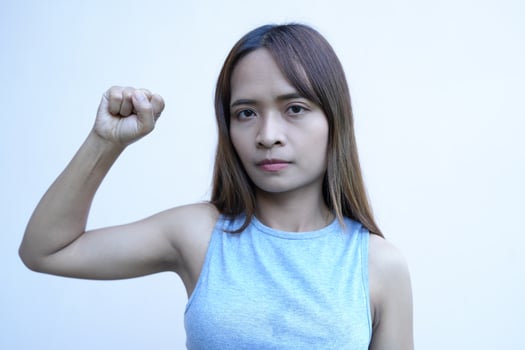 asian woman Raise your fist and get ready to fight. photo