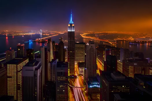the city skyline at night with lights on. AI-Generated photo